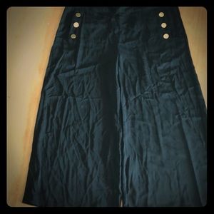 Who what wear black wide pants with gold buttons